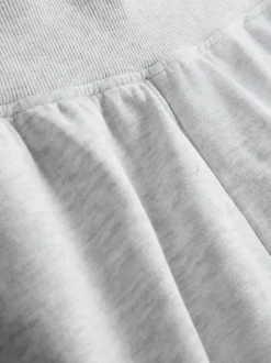 Pantalones cortos de algodón con bajo abierto