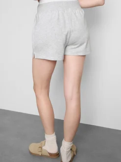 Pantalones cortos de algodón con bajo abierto