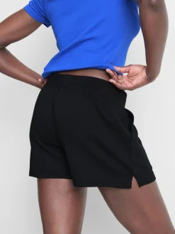 Pantalones cortos de algodón con bajo abierto