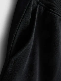 Pantalones cortos de algodón con bajo abierto