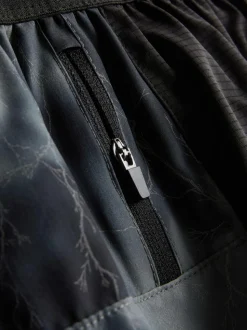 Pantalones cortos para correr con estampado reflectante