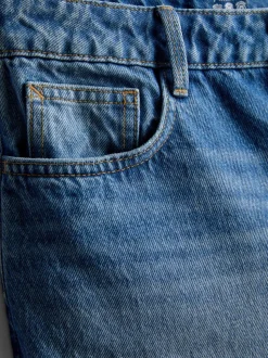 Pantalones cortos vaqueros con bajo deshilachado