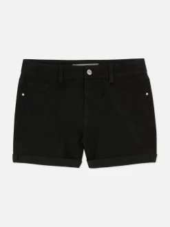 Pantalones cortos vaqueros con bajos vueltos