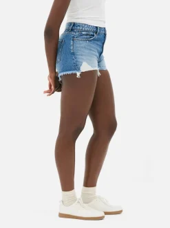 Pantalones cortos vaqueros rasgados