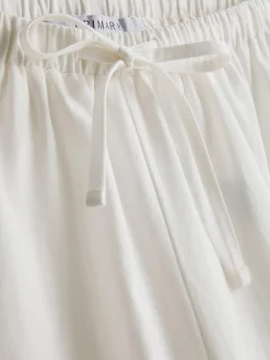 Pantalones de algodón anchos con detalle bordado