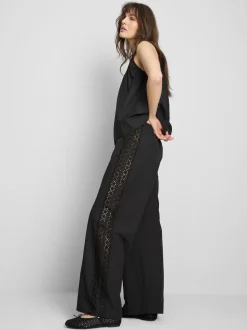 Pantalones de algodón anchos con detalle bordado
