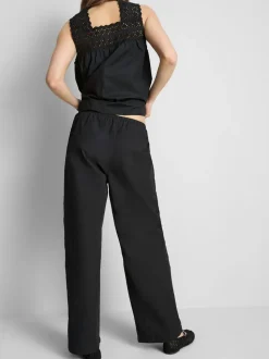 Pantalones de algodón anchos con detalle bordado