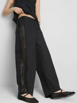 Pantalones de algodón anchos con detalle bordado