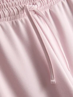 Pantalones de chándal anchos con cordón de ajuste
