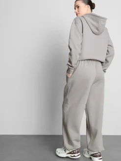 Pantalones de chándal con bajos ajustados en mezcla de algodón