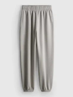 Pantalones de chándal con bajos ajustados en mezcla de algodón
