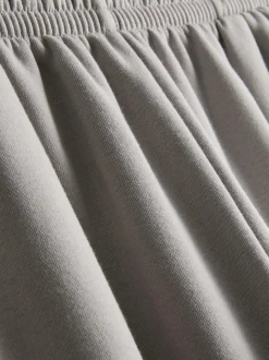 Pantalones de chándal con bajos ajustados en mezcla de algodón