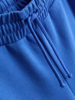 Pantalones de chándal de aeropuerto de pernera ancha