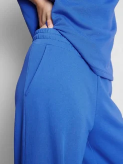 Pantalones de chándal de aeropuerto de pernera ancha