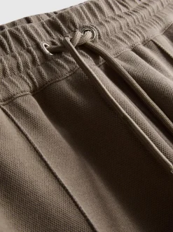 Pantalones de chándal de The Edit de piqué con cordón de ajuste