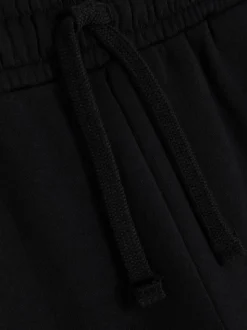 Pantalones de chándal elásticos con cordón de ajuste