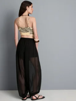Pantalones de malla con bajos ajustados