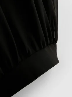 Pantalones de malla con bajos ajustados