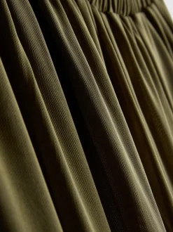 Pantalones de malla de punto con bajos ajustados