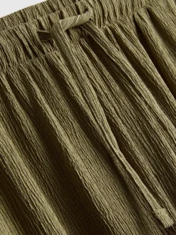 Pantalones de pernera ancha con efecto arrugado