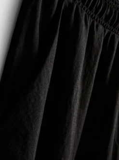 Pantalones de pernera ancha con textura