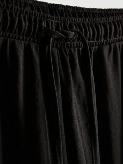 Pantalones de pernera ancha con textura