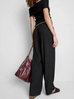 Pantalones de pernera ancha con efecto arrugado