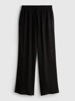 Pantalones de pernera ancha con efecto arrugado