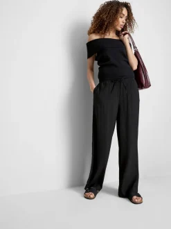 Pantalones de pernera ancha con efecto arrugado