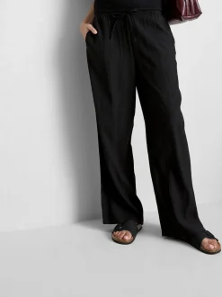 Pantalones de pernera ancha con efecto arrugado