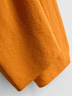 Pantalones de pernera ancha con cintura elástica