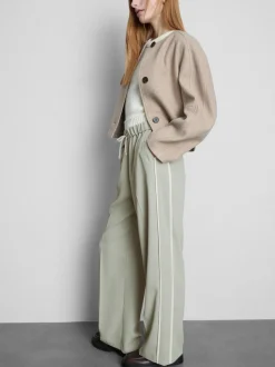 Pantalones de pernera ancha con rayas laterales