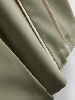 Pantalones de pernera ancha con rayas laterales