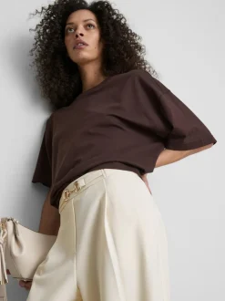Pantalones de pernera ancha con detalle dorado