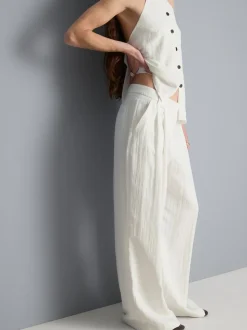 Pantalones de pernera ancha con textura