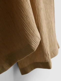 Pantalones de pernera ancha con efecto arrugado