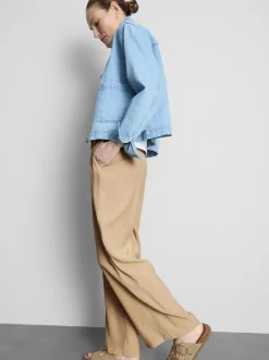 Pantalones de pernera ancha con efecto arrugado