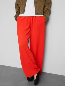 Pantalones de pernera ancha con cintura elástica
