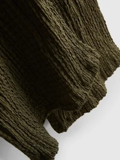 Pantalones de pernera ancha con textura