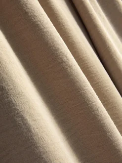 Pantalones de pernera ancha con cintura elástica