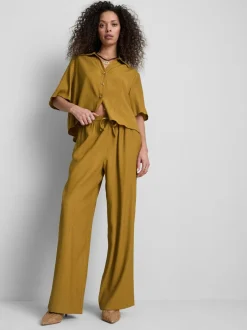 Pantalones de pernera ancha con efecto arrugado