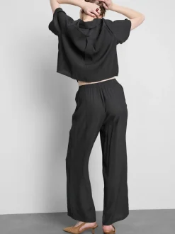 Pantalones de pernera ancha con efecto arrugado