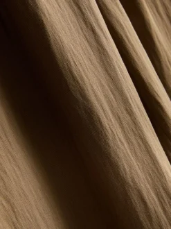 Pantalones de pernera ancha con textura By Coleen