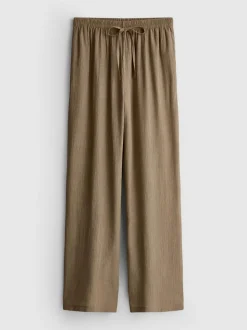 Pantalones de pernera ancha con efecto arrugado