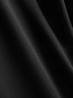 Pantalones de punto plisados de pernera ancha