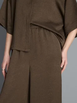 Pantalones de satén rectos texturizados