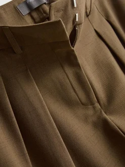 Pantalones de talle medio con pinzas