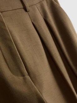Pantalones de talle medio con pinzas