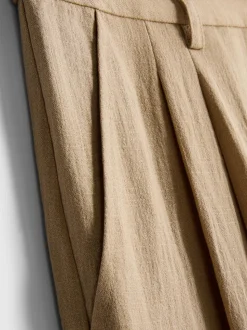 Pantalones de talle medio holgados y texturizados