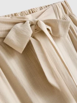 Pantalones palazzo con detalle de lazo